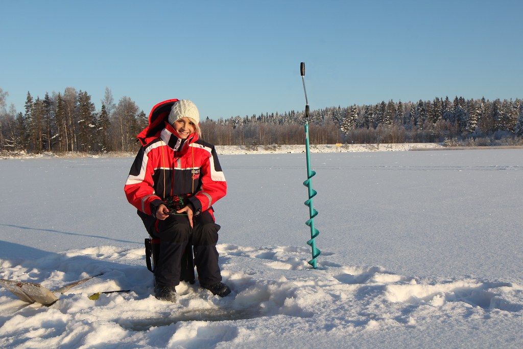 Girl ice fishing in Varkaus Ice fishing is easy and it is … Flickr