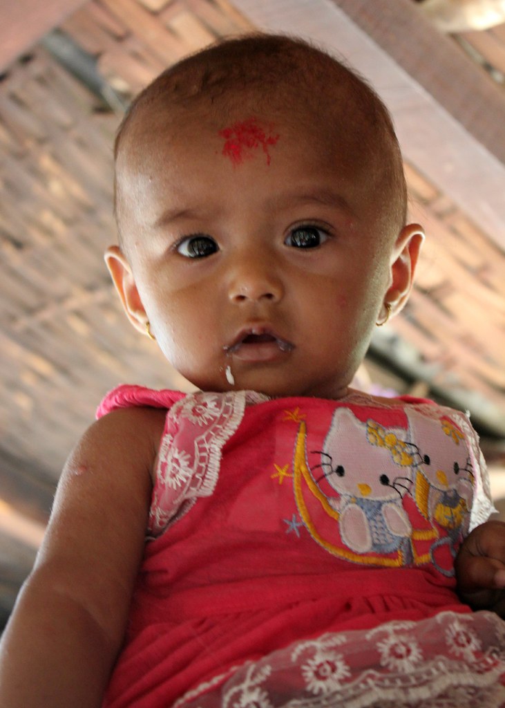 Nepalese Baby A cute Nepalese baby in the village of Praka… Flickr