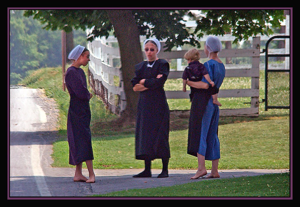 Amish Women Amish women have an early morning conversation… Flickr