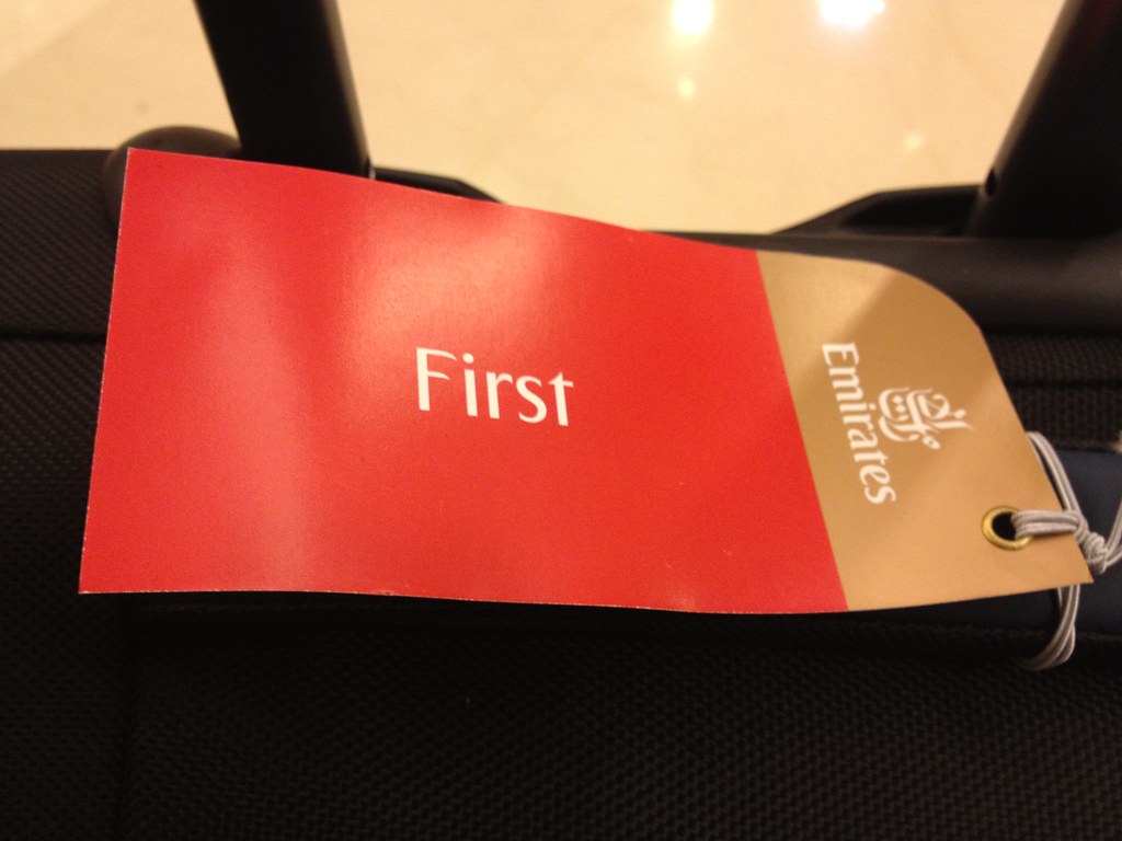 Emirates First Class hand baggage tag Rather understated f… Flickr