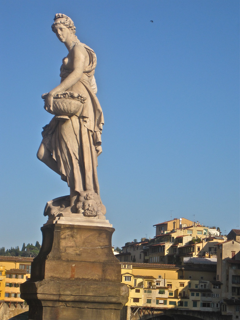 Statue, Florence, Italy Statue of a woman holding a bowl i… Flickr