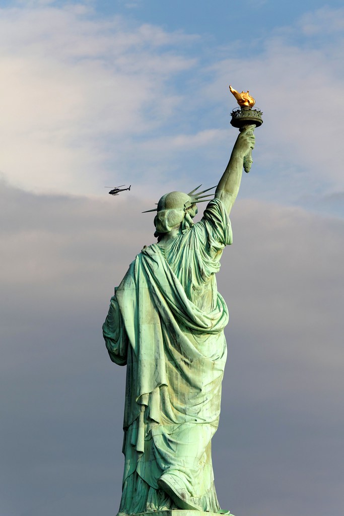 Liberty The Statue of Liberty caught as the sun appear fro… Flickr