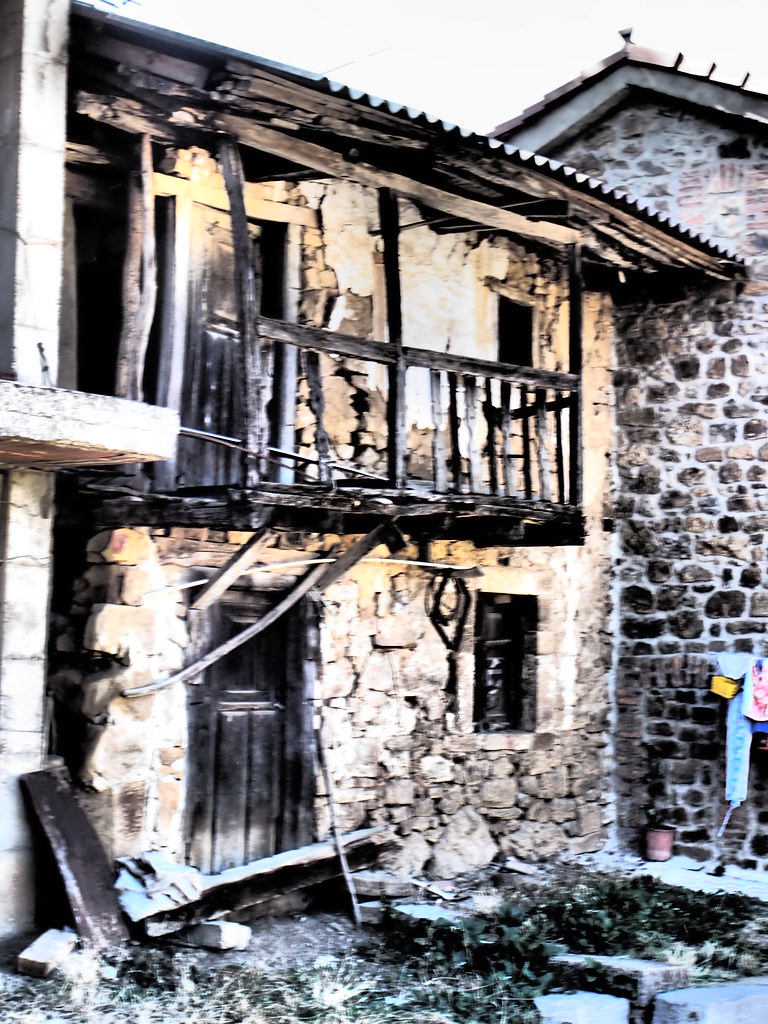 Old stone house with a balcony Villalmonte, Leon, Spain