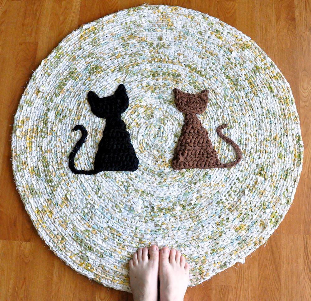 Two Cat Rug Custom ordered rug. Measures 36" in diameter. Emily Kircher Flickr
