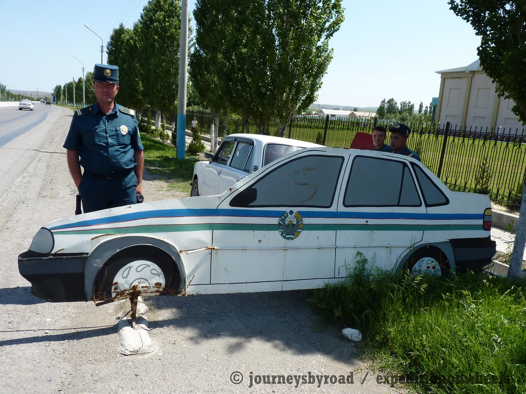 Dummy police car to control traffic in Uzbekistan Journeys By Road