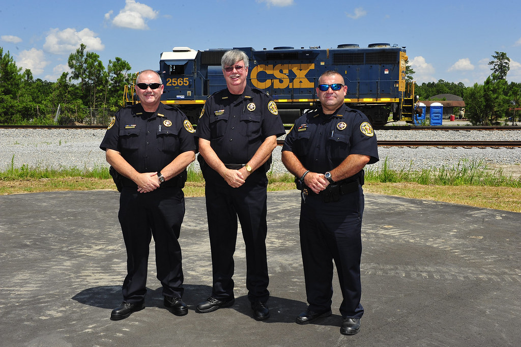 CSX Railroad Police Officers pose infront of train Flickr