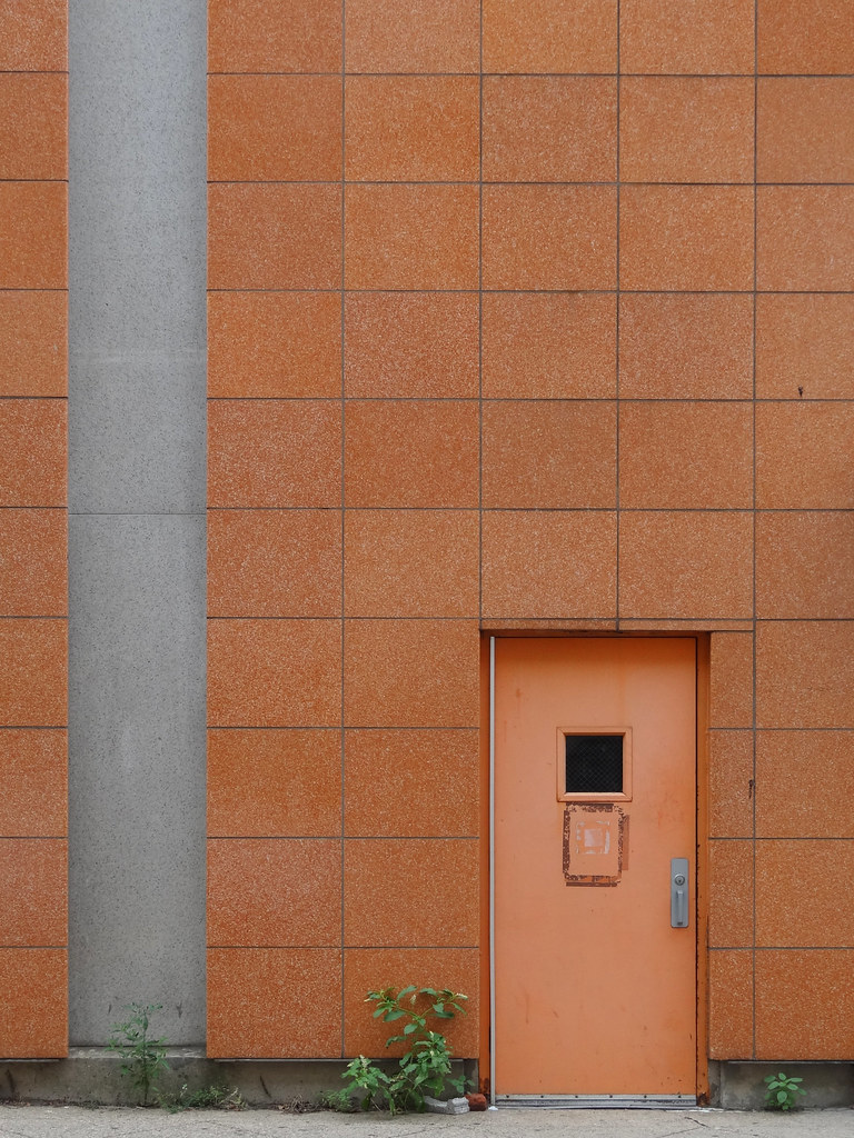 Orange Door Orange door in an orange tile wall seen in the… Flickr