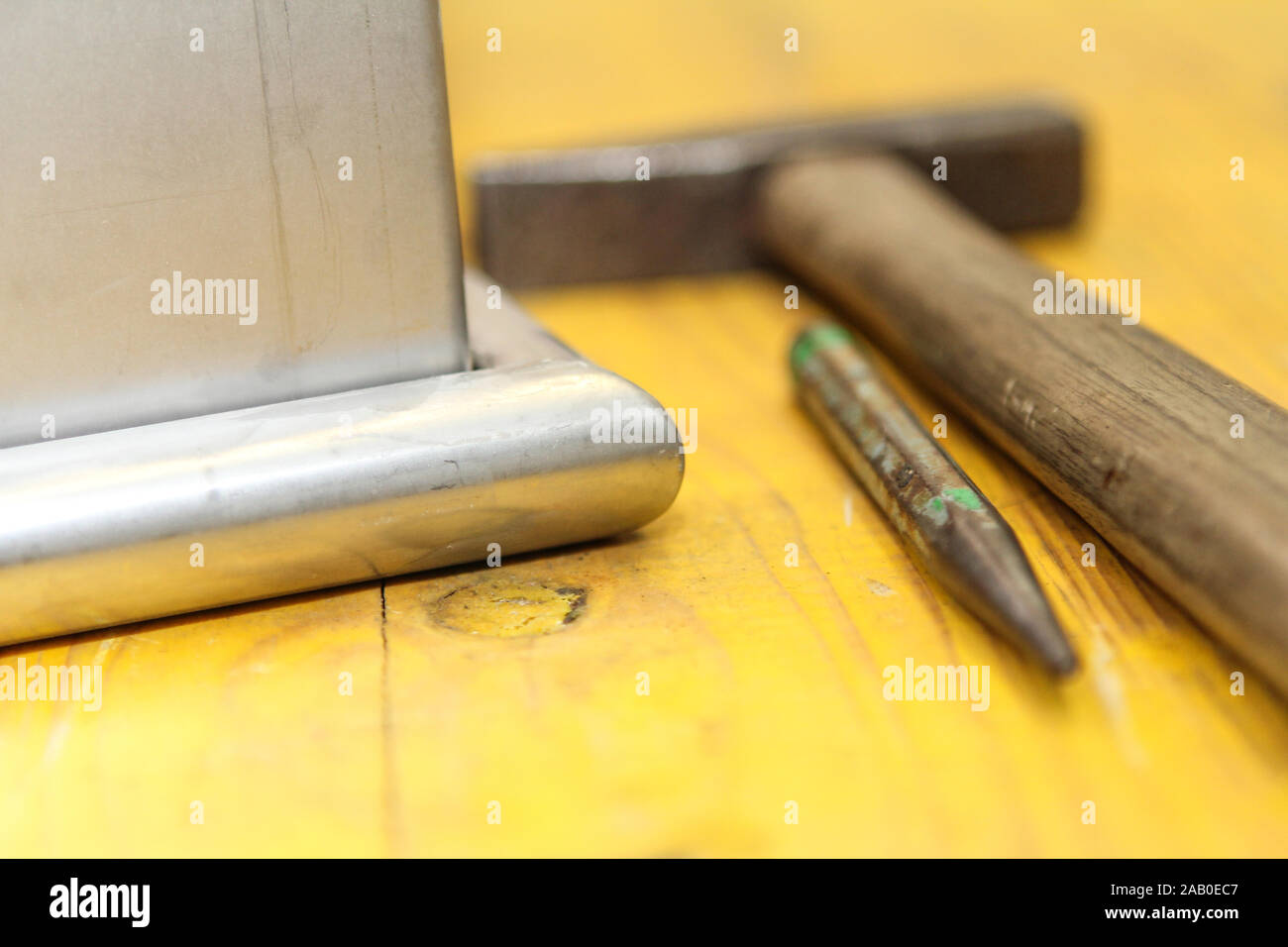 hammer and chisel tools for plumbers Stock Photo Alamy