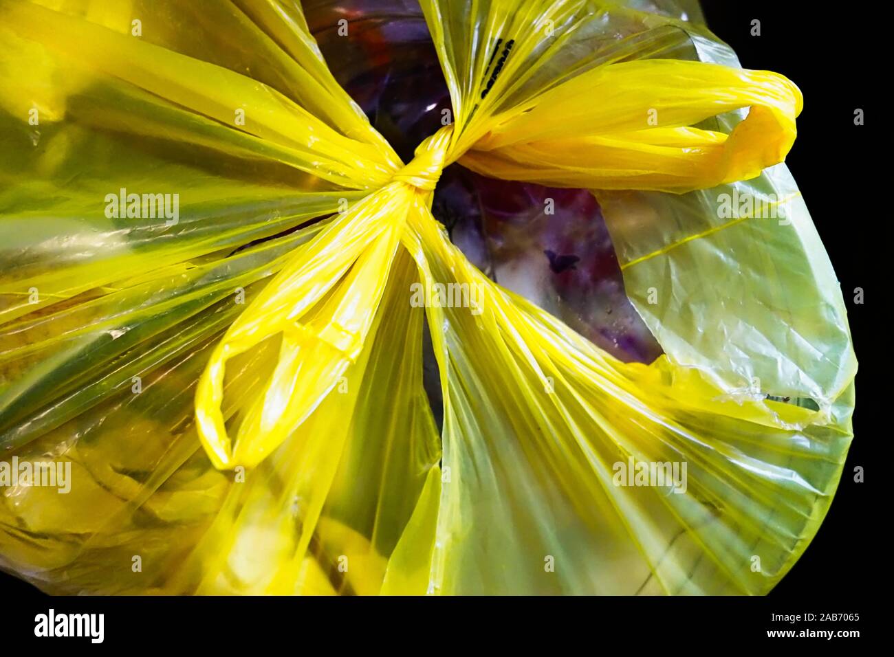 Yellow Plastic Garbage Bag Stock Photo Alamy