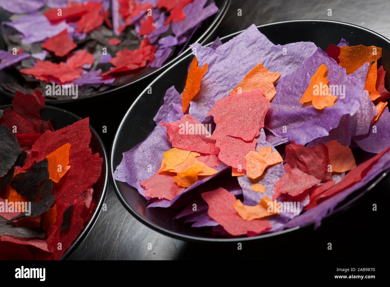 Colored chips in a bowl Stock Photo Alamy