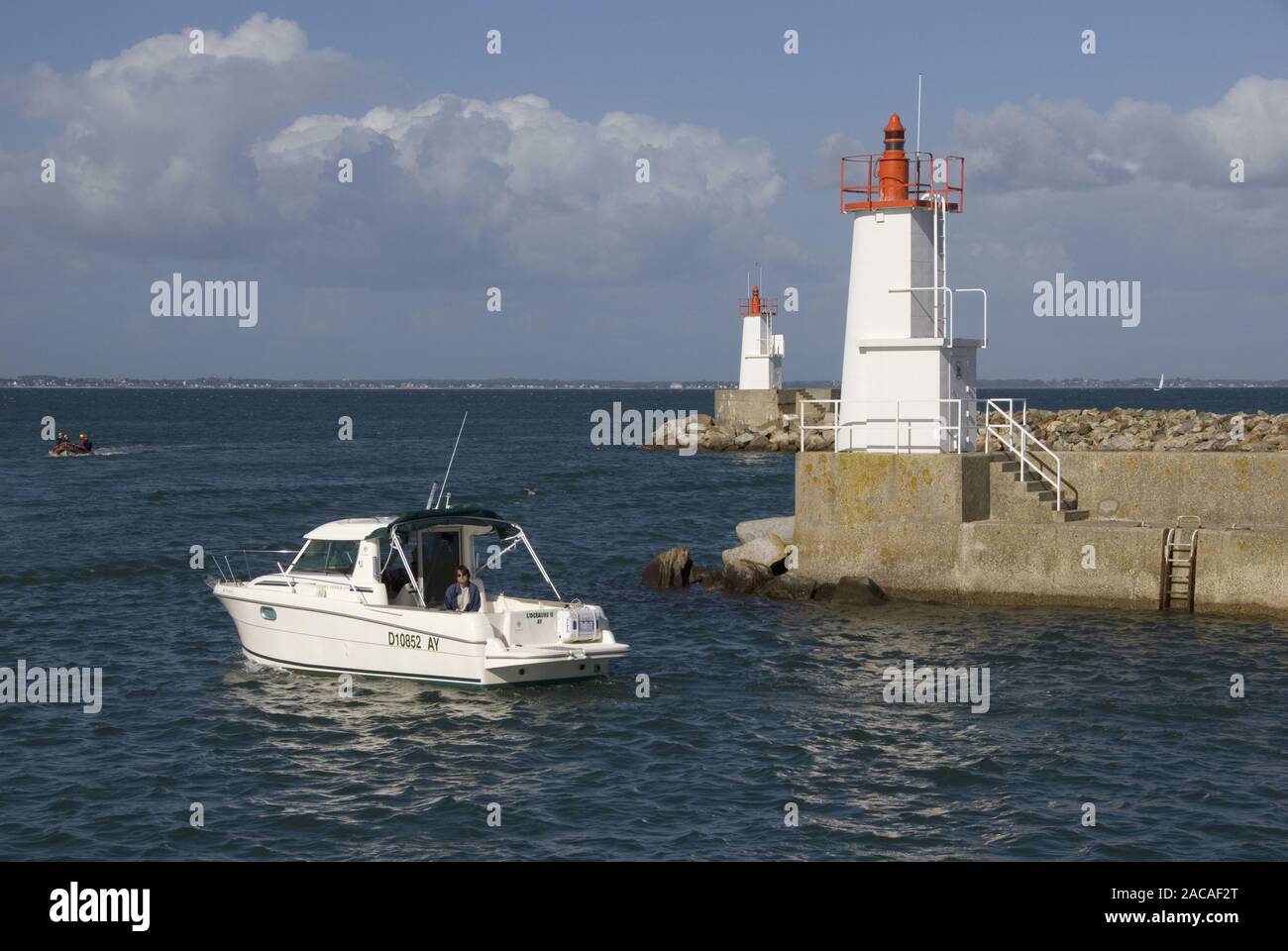 Lighthouse with boat hires stock photography and images Alamy