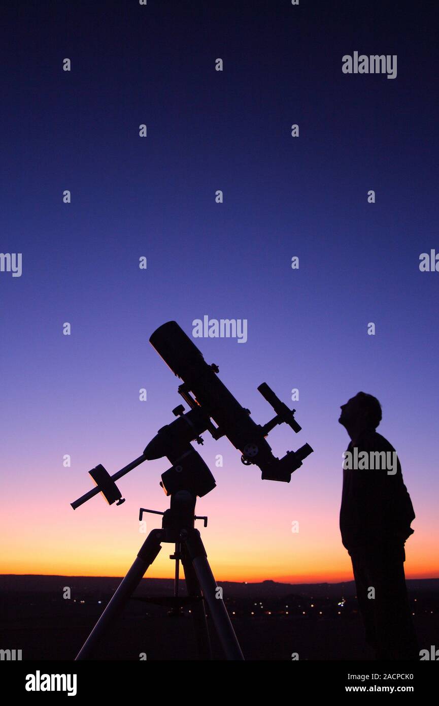 Astronomer using a telescope Stock Photo Alamy