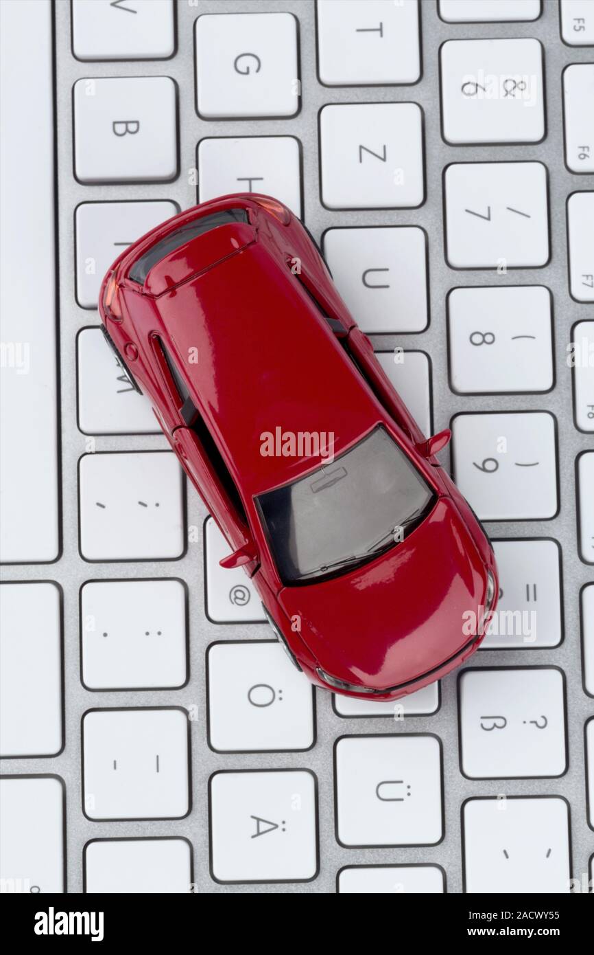 Car on computer keyboard Stock Photo Alamy