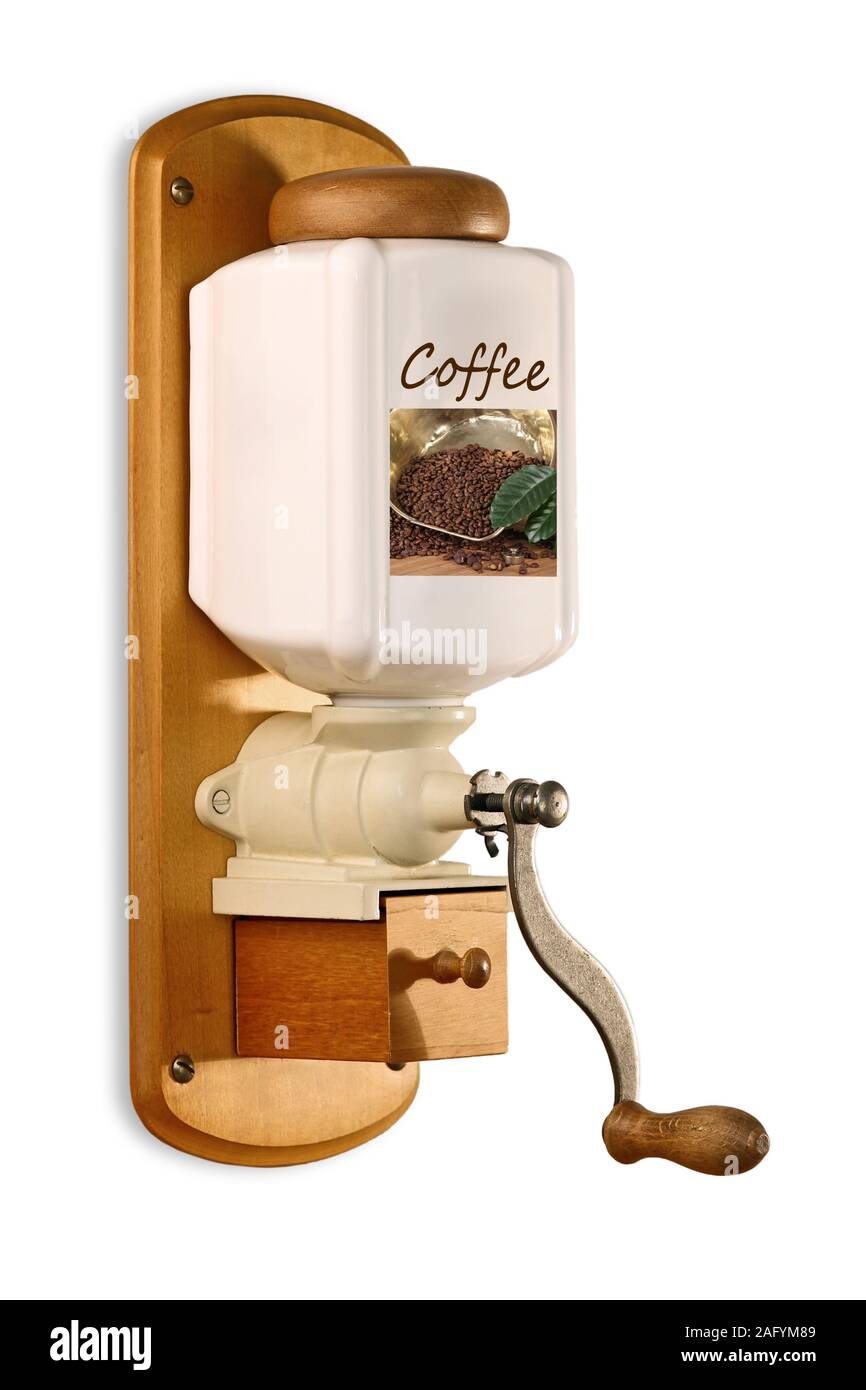 Old coffee mill, isolated Stock Photo Alamy