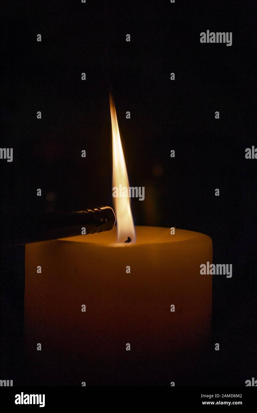Candle light burning Stock Photo Alamy