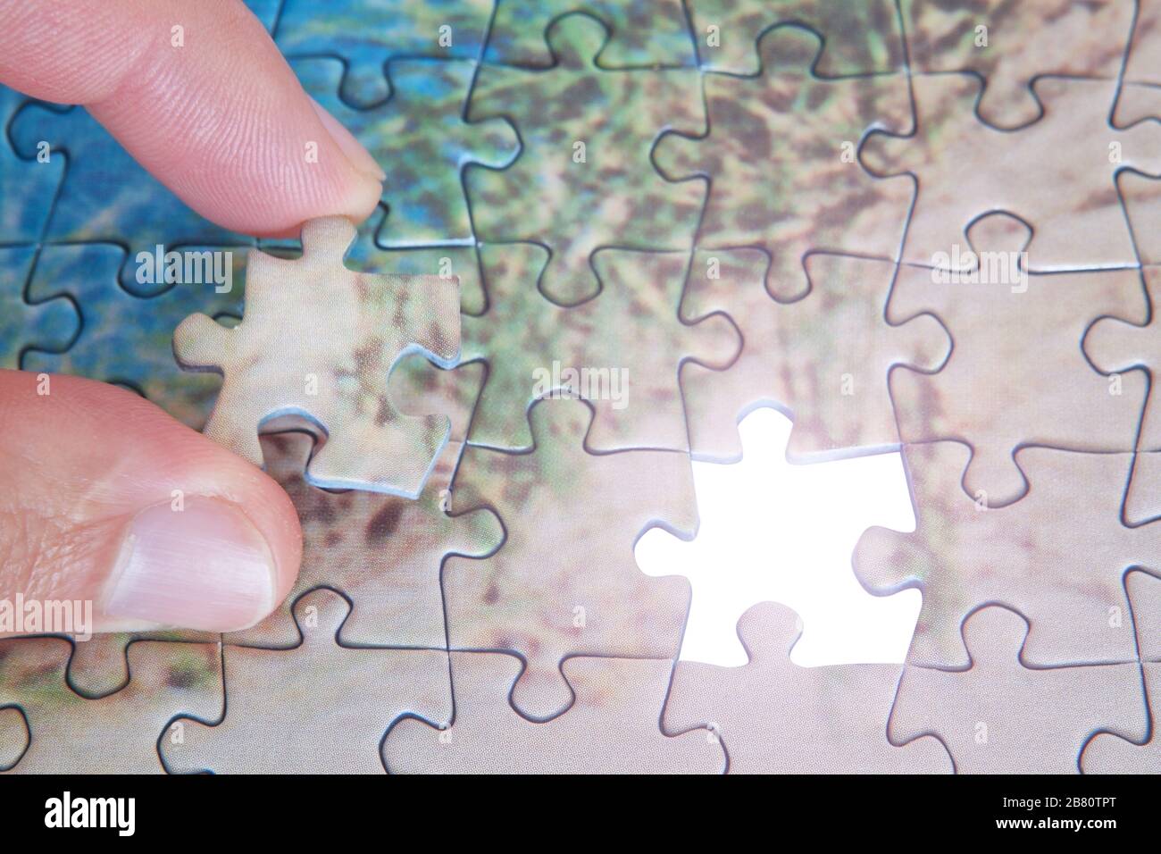 The last missing piece puzzle Stock Photo Alamy