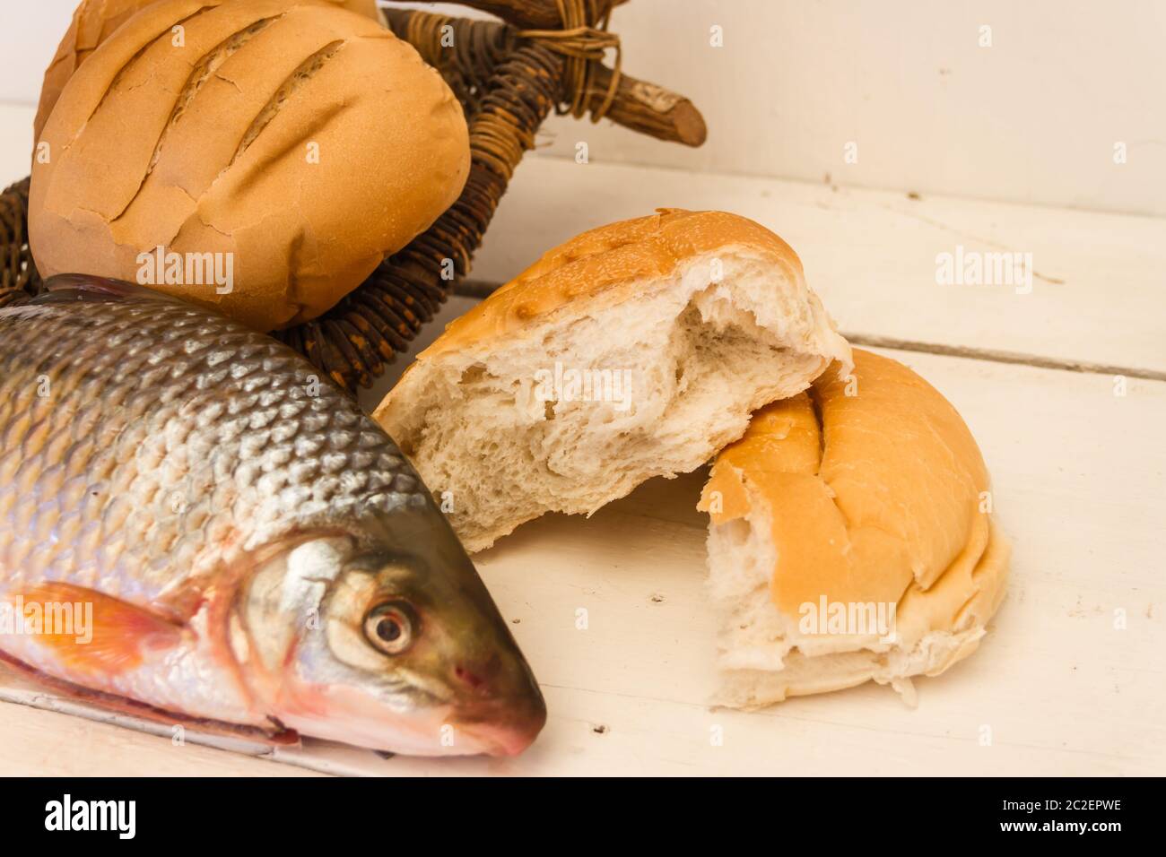 Five loaves of bread and two fish hires stock photography and images