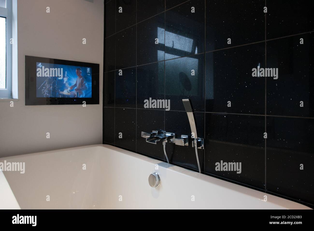Bathroom with TV screen Stock Photo Alamy