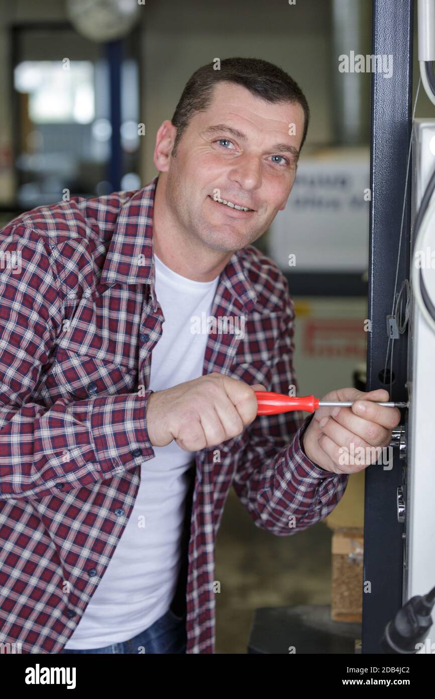 construction worker assembles a metal frame Stock Photo Alamy
