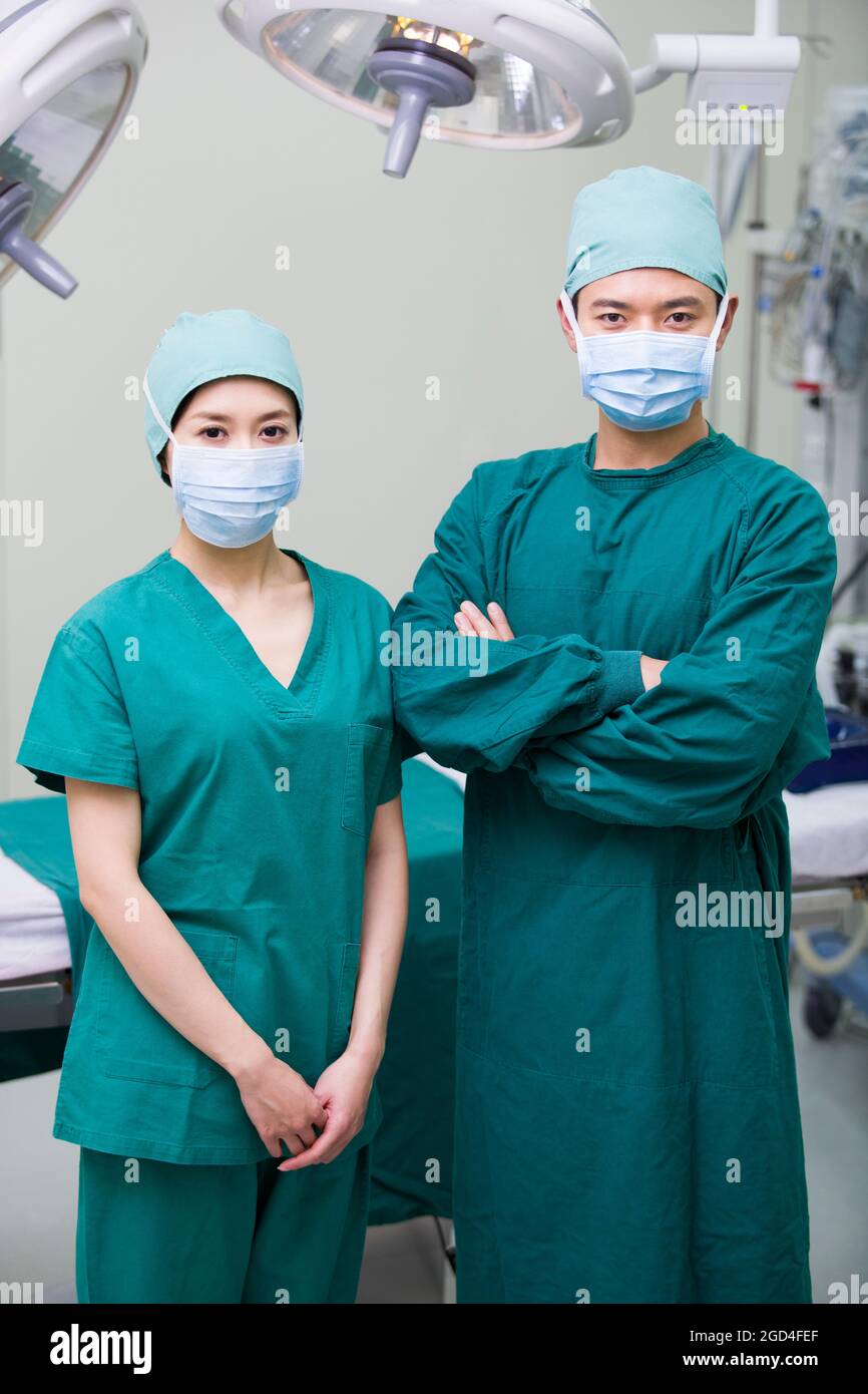 Plastic surgeons in operating room Stock Photo Alamy