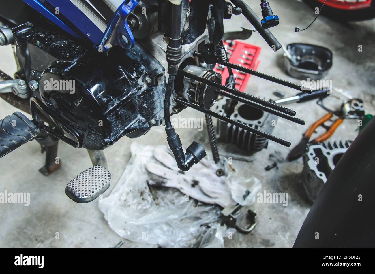 Mechanical repairs engine motorcycle Stock Photo Alamy
