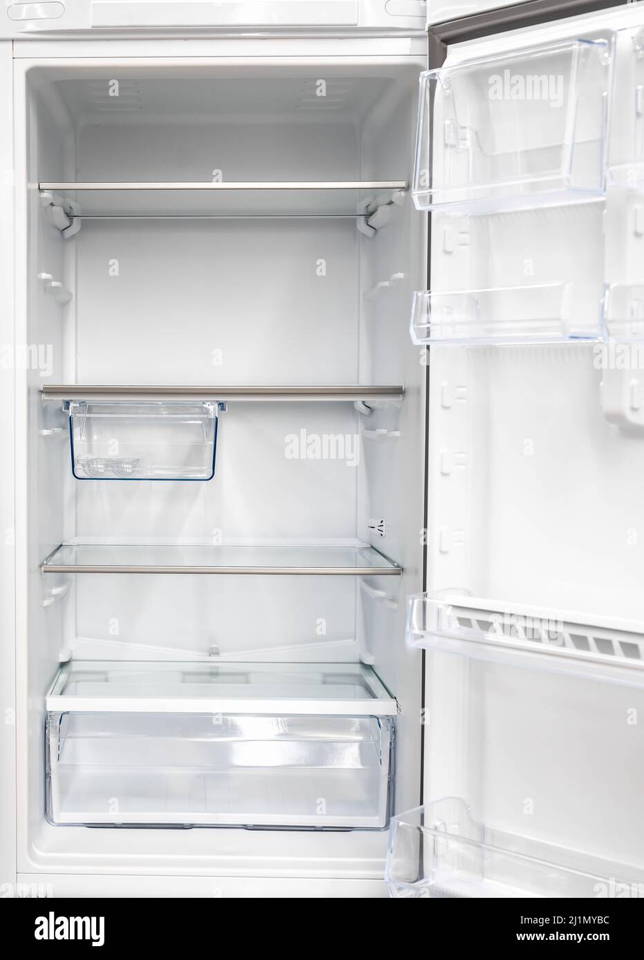 New clean refrigerator. Opened empty refrigerator. Refrigerator open