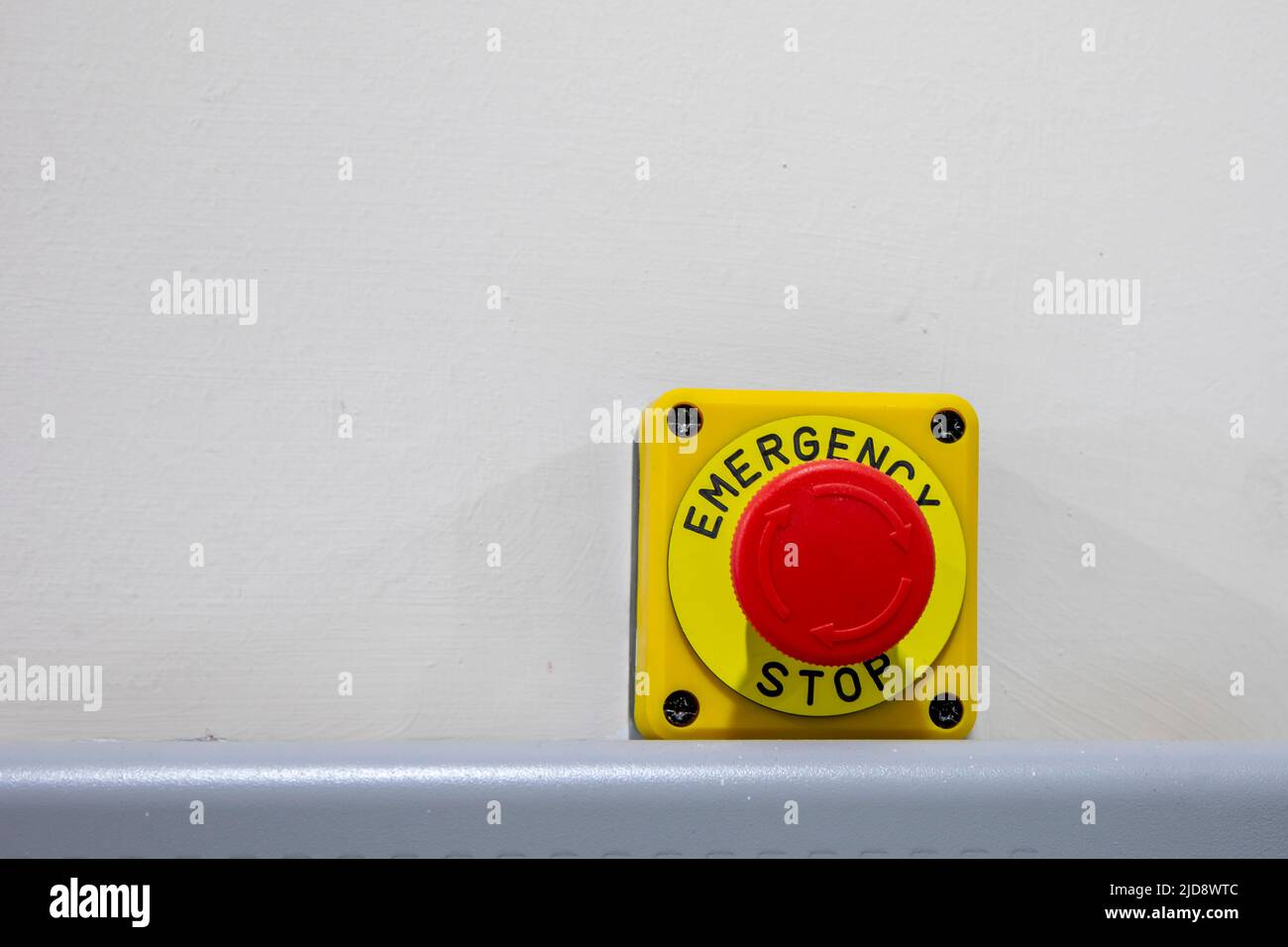 red emergency stop push button on engine Stock Photo Alamy