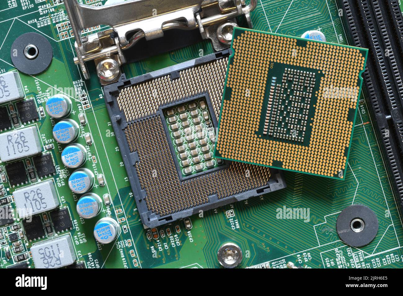 Detail of a CPU Processor over his Socket on a Motherboard. Printed