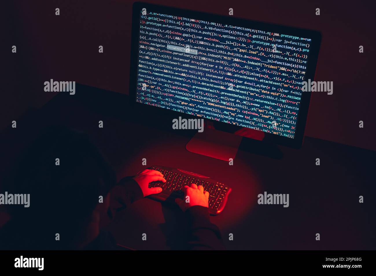 Man using computer and programming to break code. Cyber security threat