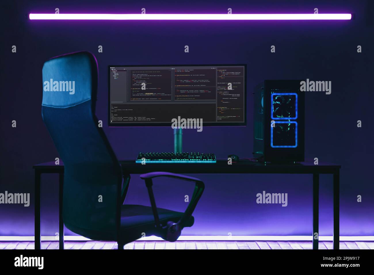 Home office programmer workplace with professional coding setup on