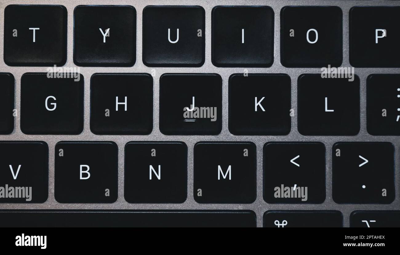 Laptop keyboard alphabets keys closeup concept image. Top view photo of