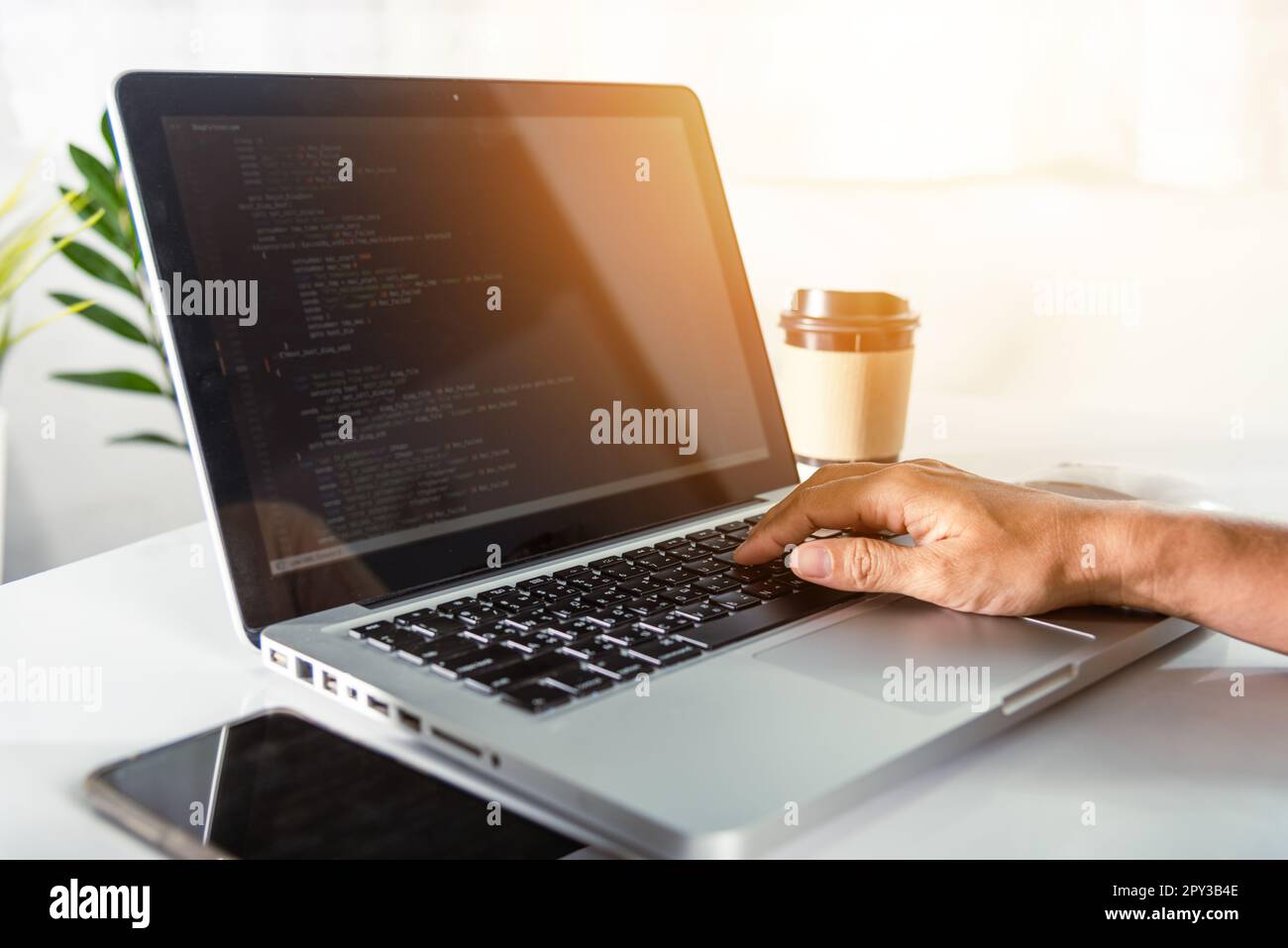  application development. programmer woman writing program code