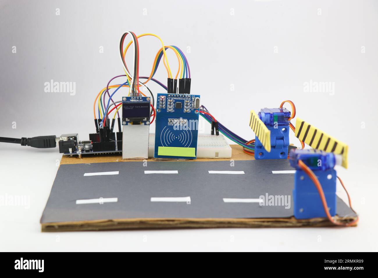 Prototype of automatic toll collection system using RFID sensor and
