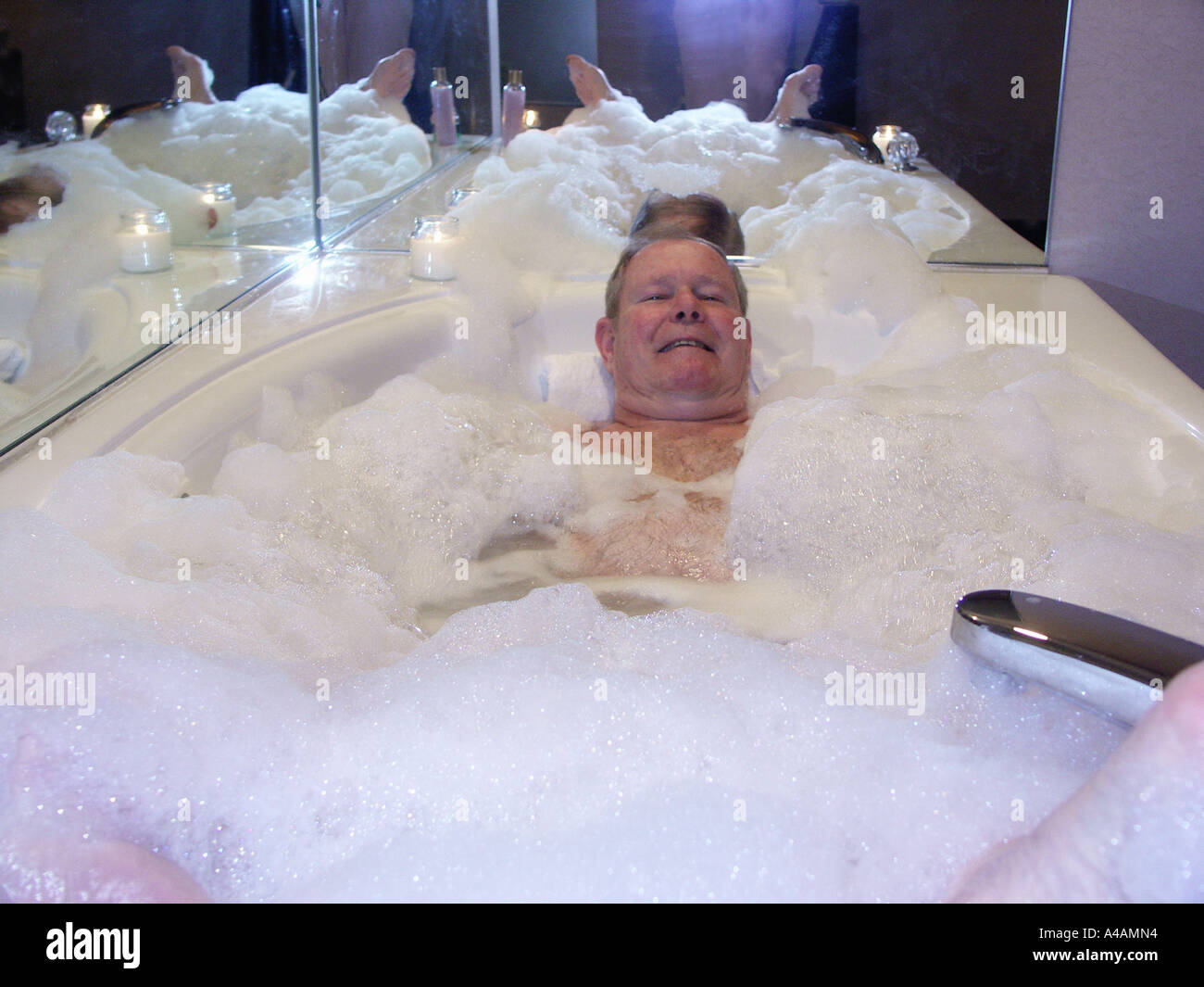 Man having bubble bath hires stock photography and images Alamy