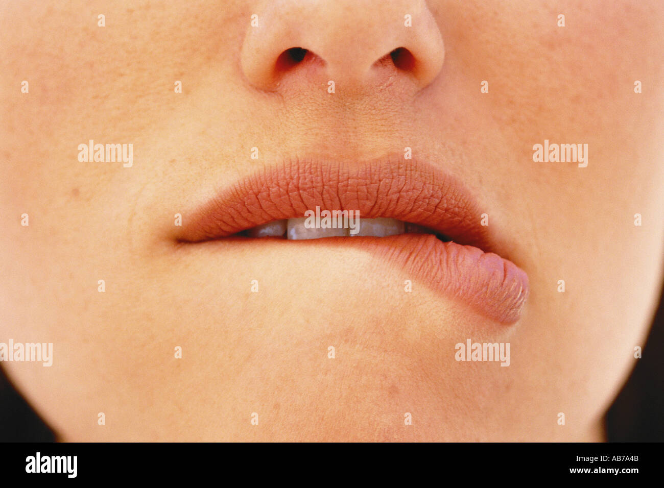 Bitten lip hires stock photography and images Alamy