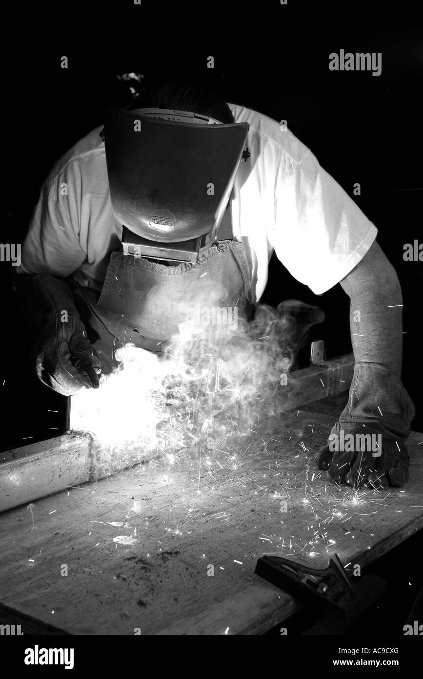 Welder working sparks flying Black and White Stock Photos & Images Alamy