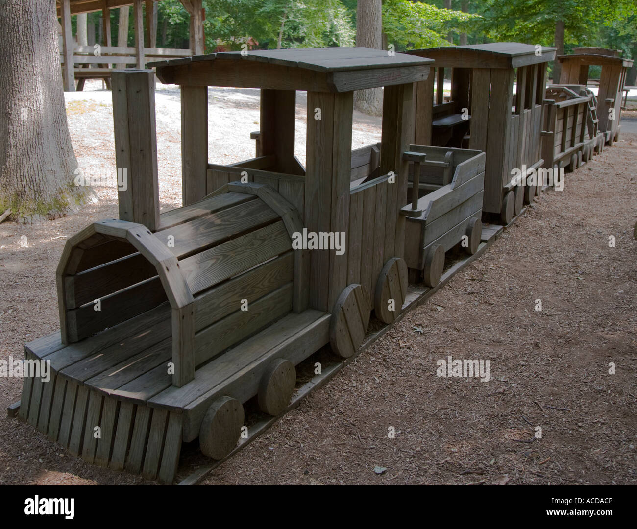 Miniature wooden train in a playground Stock Photo Alamy
