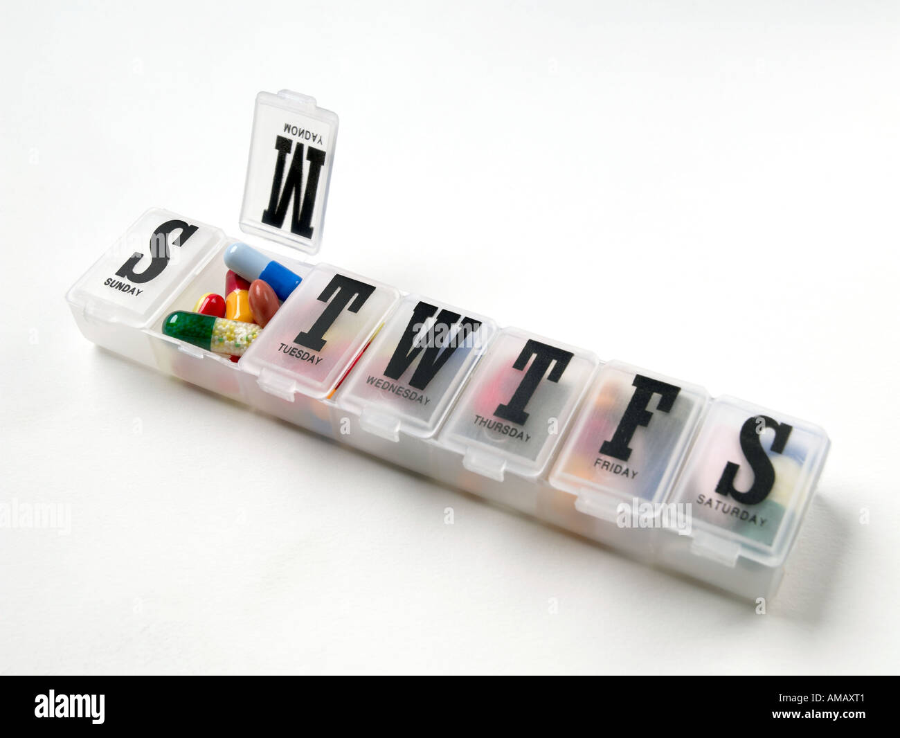Pill case dispenser Stock Photo Alamy