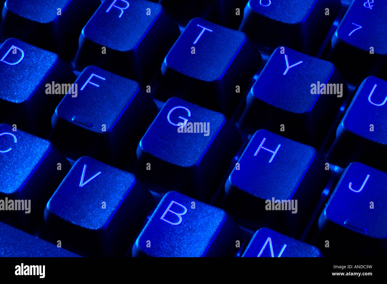 Blue computer keyboard with alphanumerical qwerty keys Stock Photo Alamy