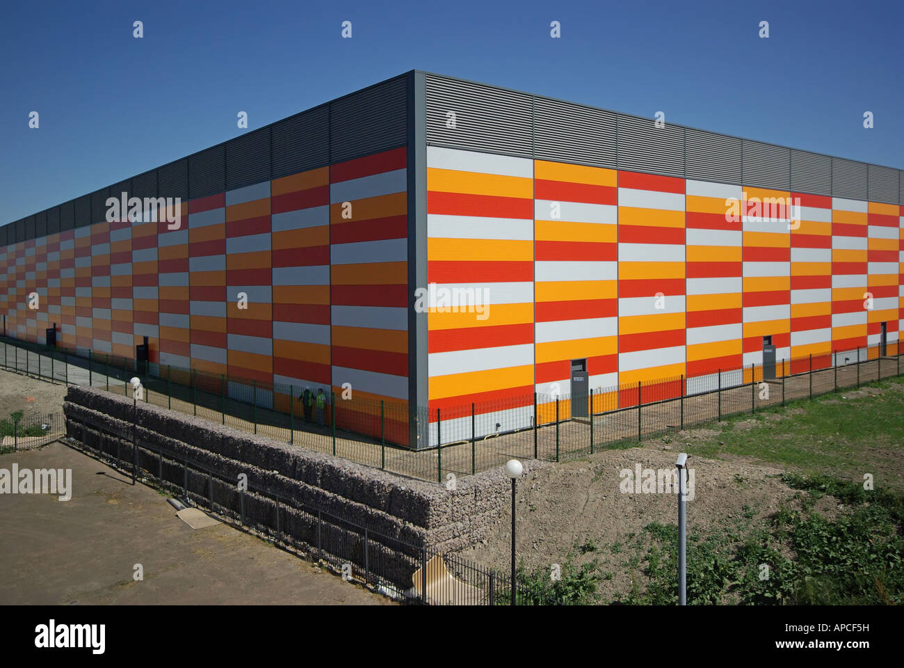 Bright colour cladding panel on windowless warehouse distribution