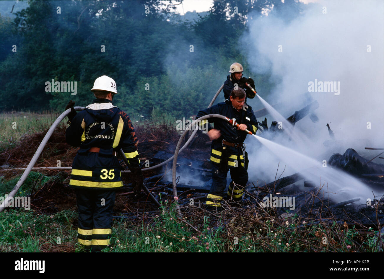 Fire brigade at work Stock Photo Alamy
