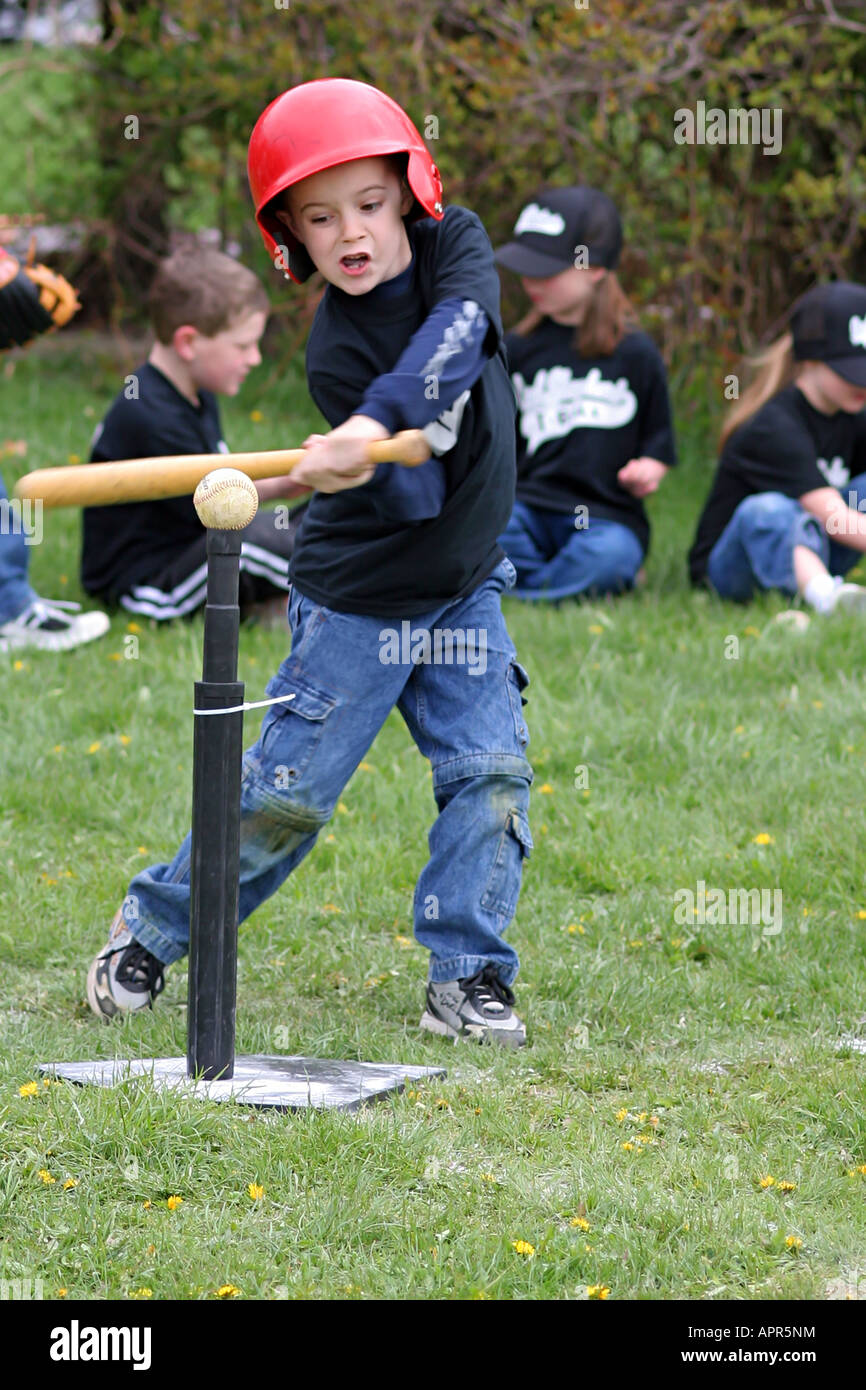 A boy learning tee ball Stock Photo Alamy