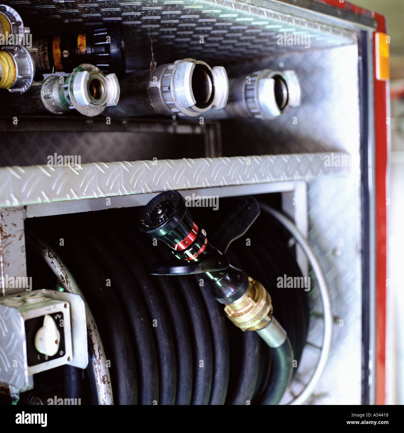Hoses on fireengine Stock Photo Alamy