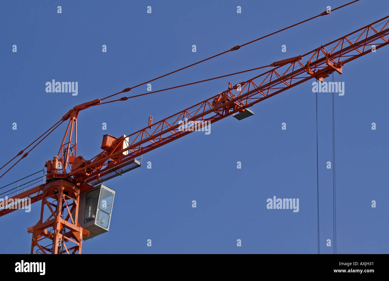 Red coloured crane hires stock photography and images Alamy