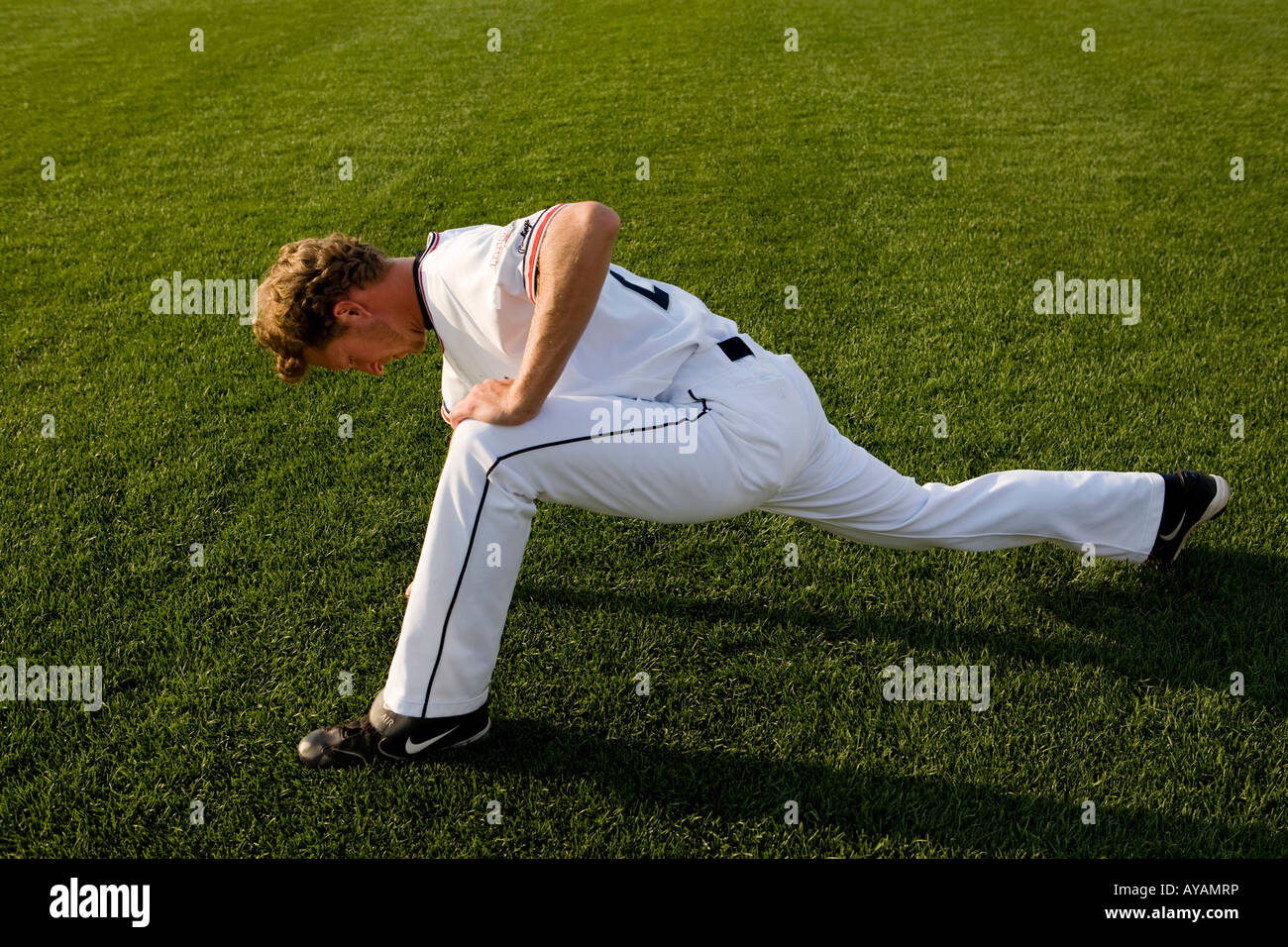 Baseball player stretching Stock Photo Alamy