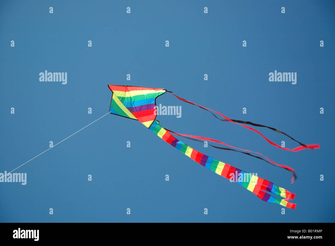 kite flying on a string Stock Photo Alamy
