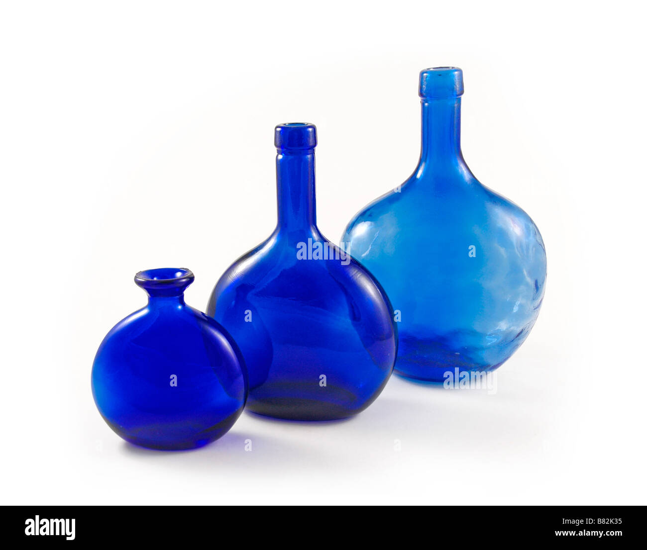 Three blue bottles Stock Photo Alamy