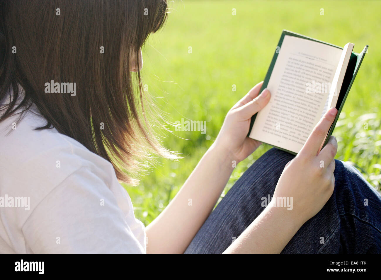 Reading a book Stock Photo Alamy