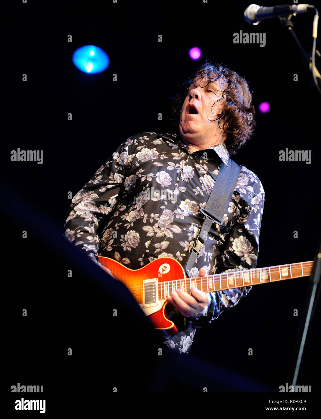 Guitarist Gary Moore performs on stage at the Vibes from the Vines