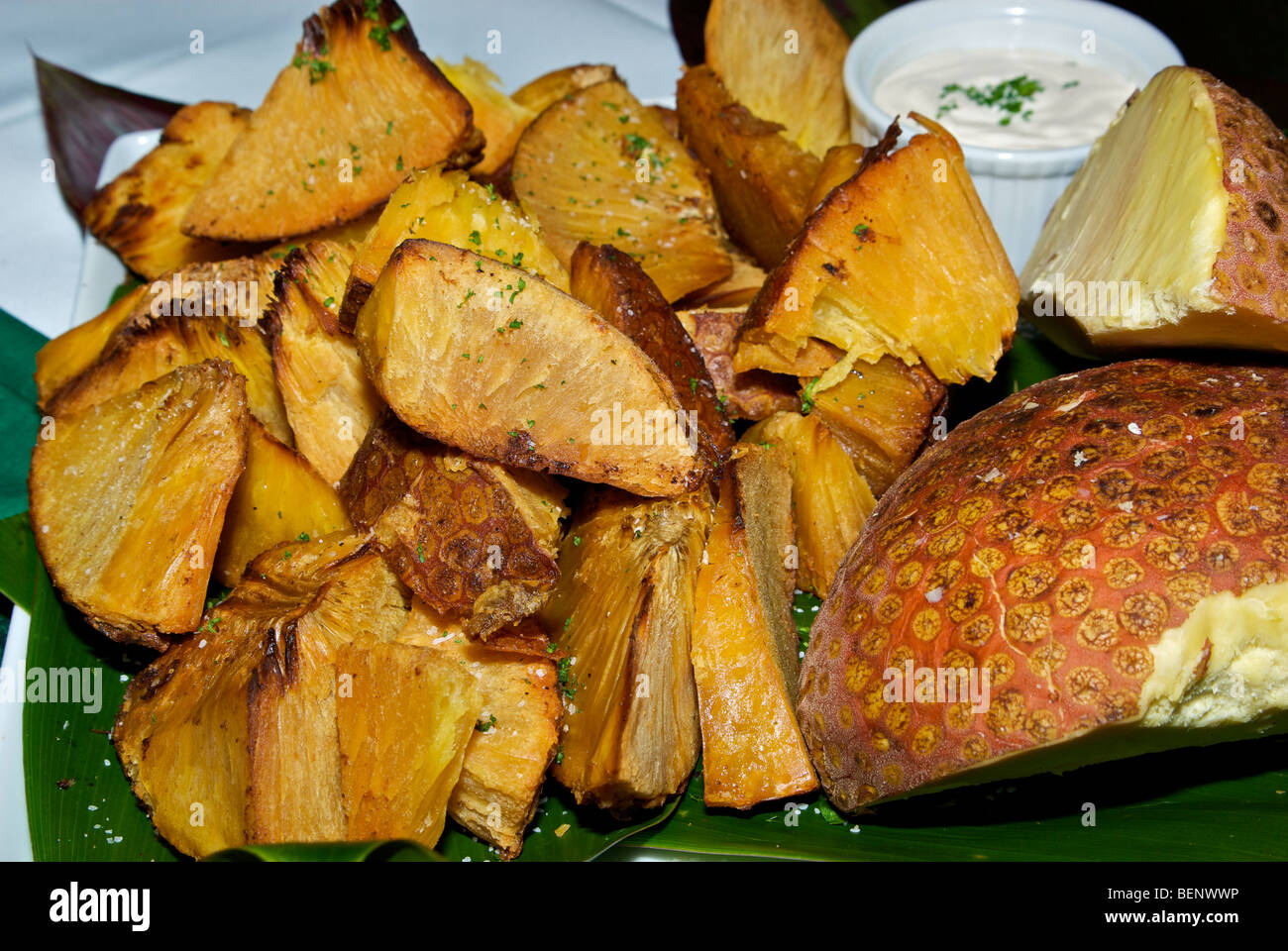 Oven roasted breadfruit chunks Stock Photo Alamy